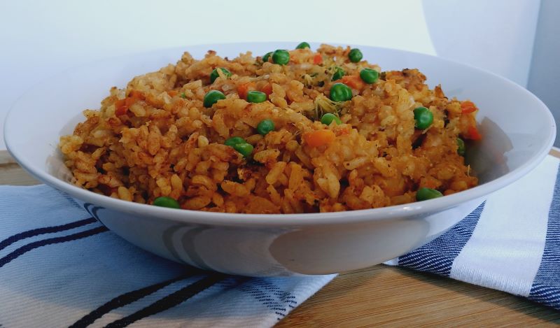 Here is a bowl of the red lentil risotto in a rice cooker dish. Look at the brightness of the peas and broccoli.